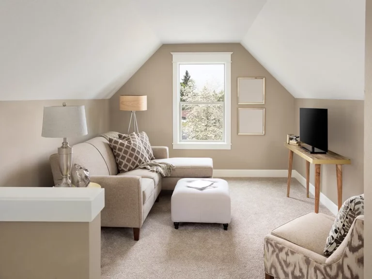 living room carpet with cream and grey tones in a dormer roof