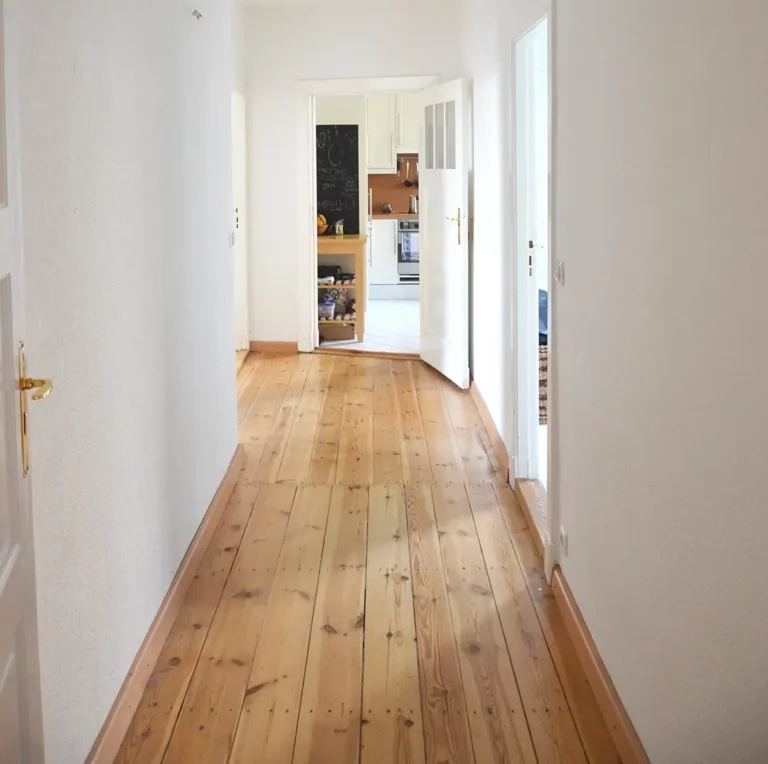 warm pine coloured laminate flooring is available through easipay's pay weekly laminate flooring plans